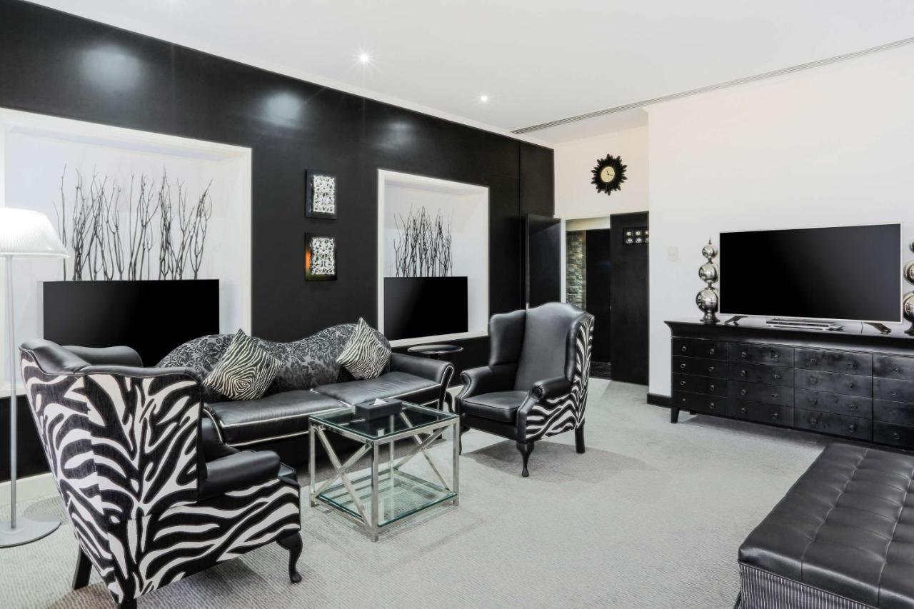 Radisson Blu Resort, Sharjah Eksteriør billede A living room with zebra print furniture